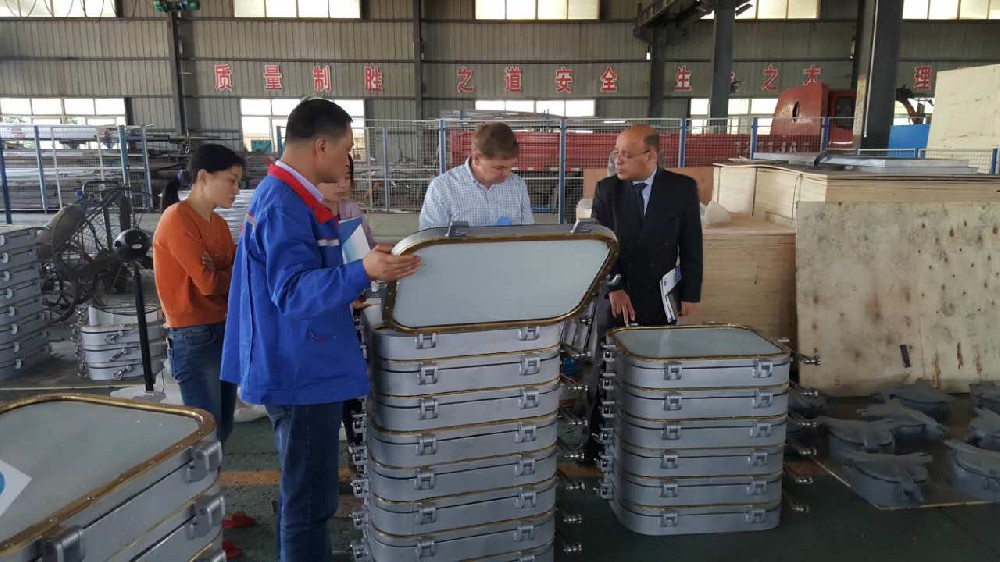 American customers come to the company to check and accept products